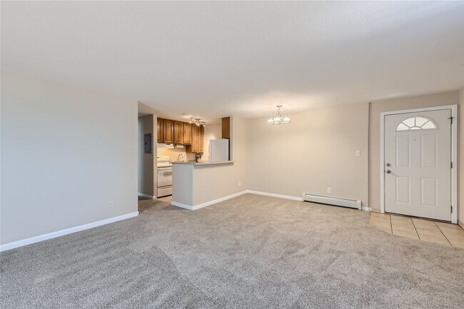 Building Photo - Top-floor, 2-bed 1-bath condo located near the highly desirable Old Town Arvada!