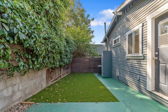 Building Photo - Stylish 2-Bedroom Retreat with Private Yar...