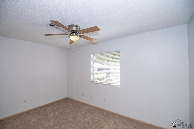 Building Photo - 7220 E 24th Ln