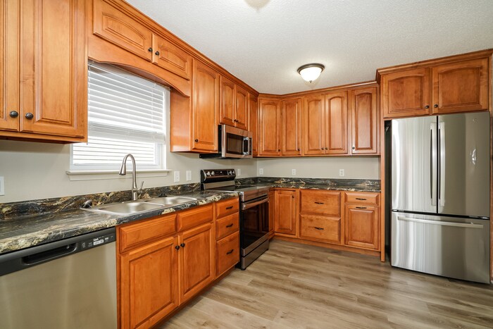 Building Photo - 6744 Everbloom Ln