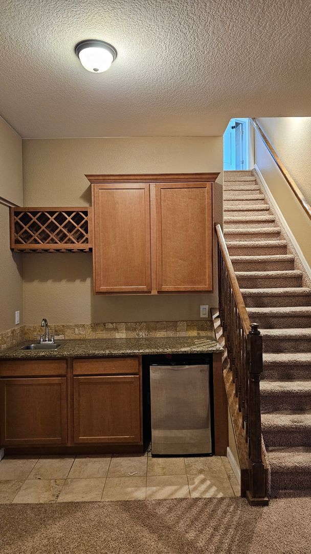 Building Photo - SPACIOUS HOME WITH FINISHED BASEMENT IN NORTH RANGE VILLAGE!