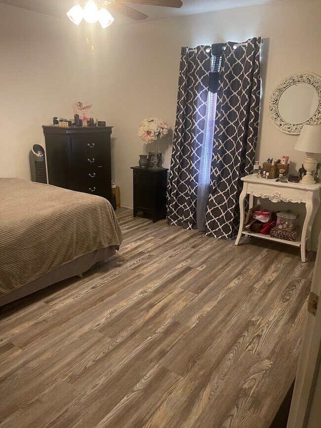 UNIT E, old photo with furnishings - 605 College St