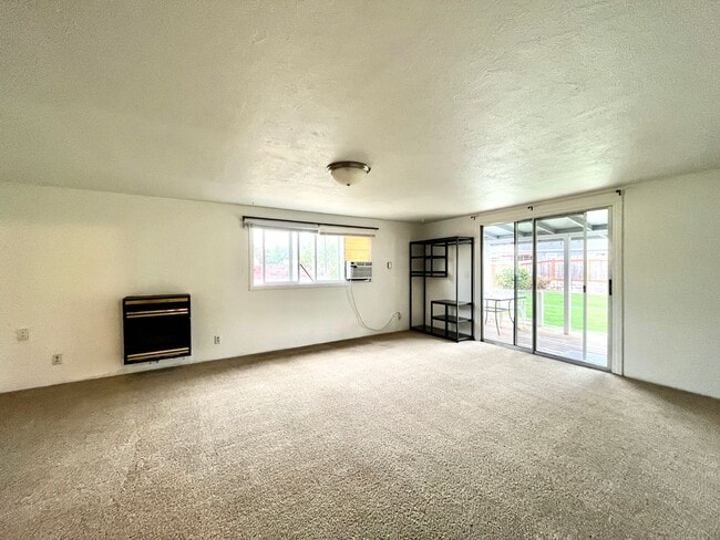 Building Photo - Cozy Single family home with two car garage and controlled access gate