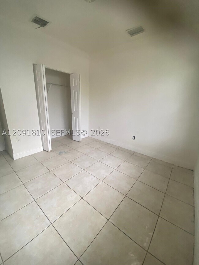 Building Photo - 9752 NW 26th Ave