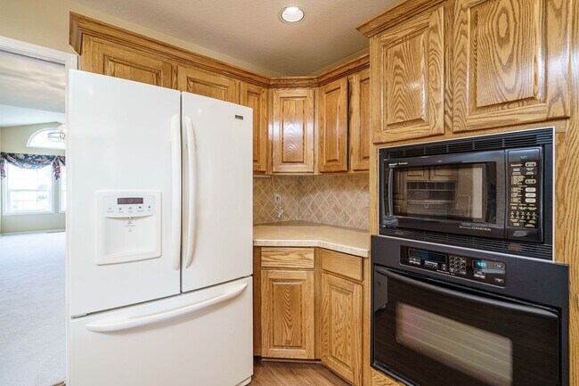 Building Photo - Beautifully Landscaped 1/4 acre with Well Maintained 4 bedroom 2 Bath Home with 3 Car Garage