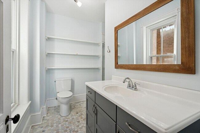 Building Photo - Stylish Phoenixville Rowhome with Exposed Brick, High Ceilings & Central Air