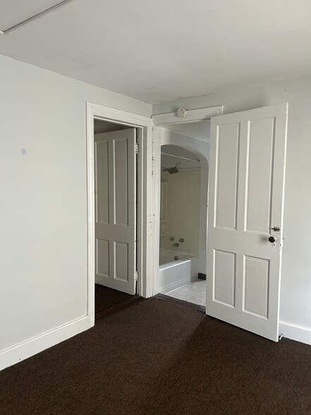 Bathroom and 3rd floor stairway - 604 E 5th St