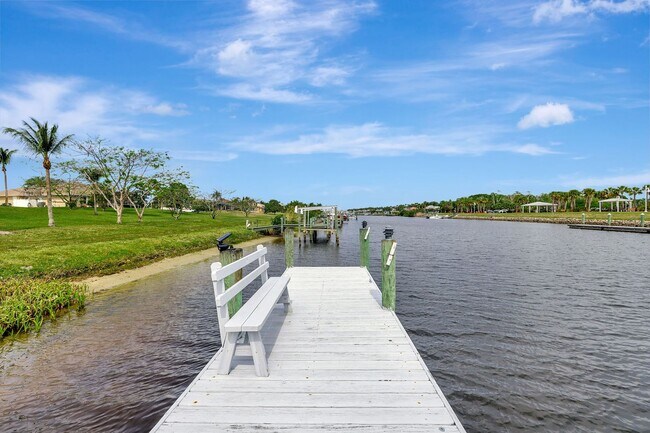 Building Photo - A BOATER'S PARADISE WITH THIS STUNNING 3 BEDROOM, 2 BATH WATERFRONT POOL HOME W/DOCK & BOAT LIFT ...