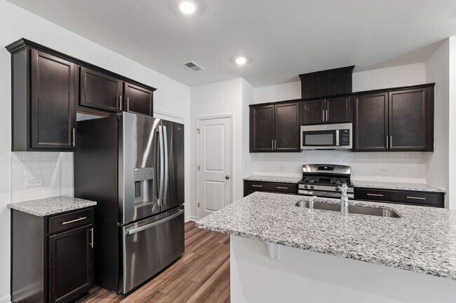 Building Photo - Modern 3-Bedroom Townhome Near Downtown Du...
