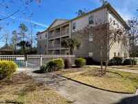 Building Photo - Welcome to this stunning 1st floor condo l...