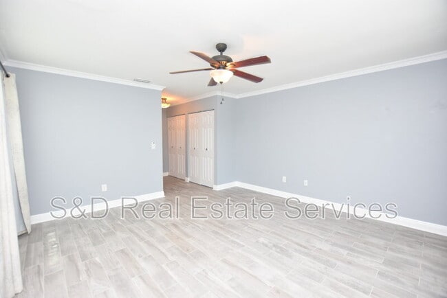 Building Photo - 8212 Riverboat Dr