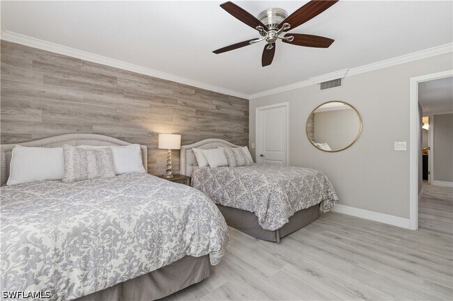 Building Photo - 6080 Pelican Bay Blvd