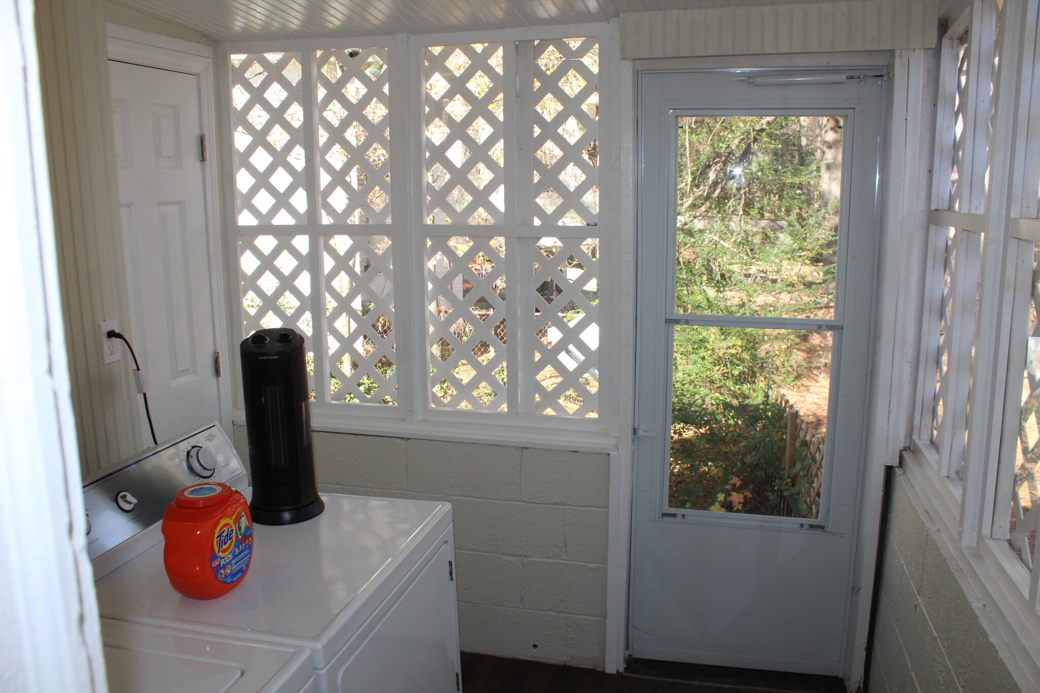 Back patio with washer/dryer and storage - 242 Victory Dr SE
