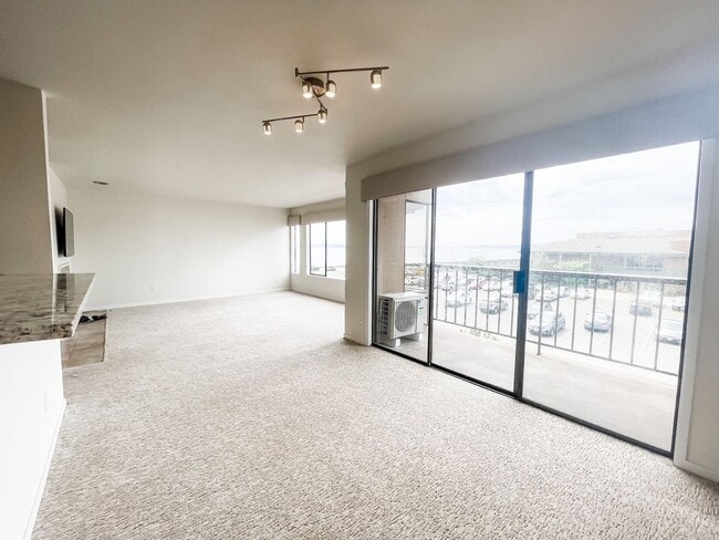 Building Photo - MARINER MANOR IS A PEACEFUL SOUND VIEW CONDO