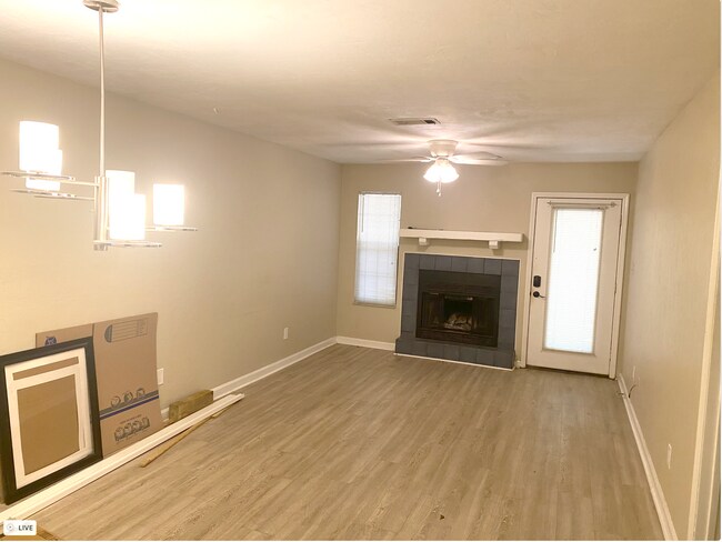 fireplace in great room - 1104 Greentree Ct
