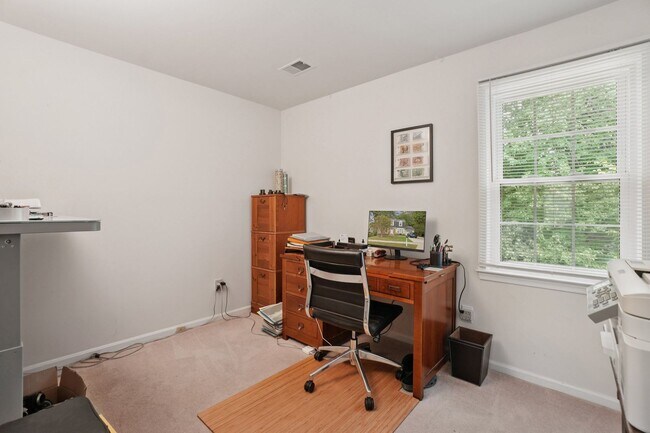 Building Photo - ocated in a sought-after community with to...