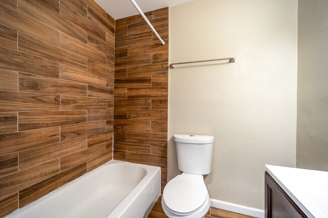 Building Photo - Spacious 3-Level Townhouse with Finished Basement and Fenced Patio