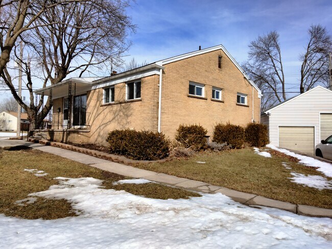 Side of house & 2 car garage - 1004 Gould Rd