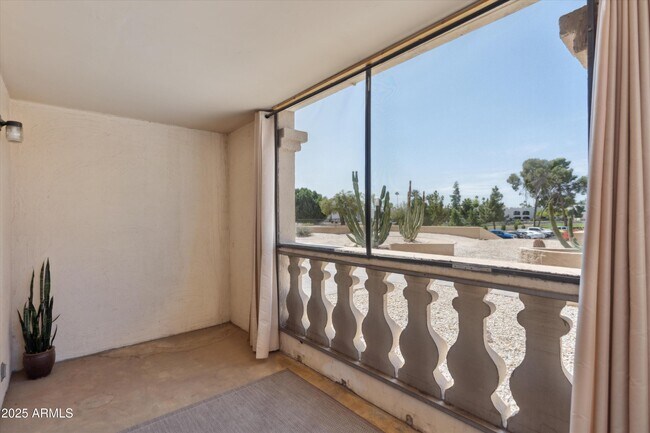 Building Photo - 7940 E Camelback Rd