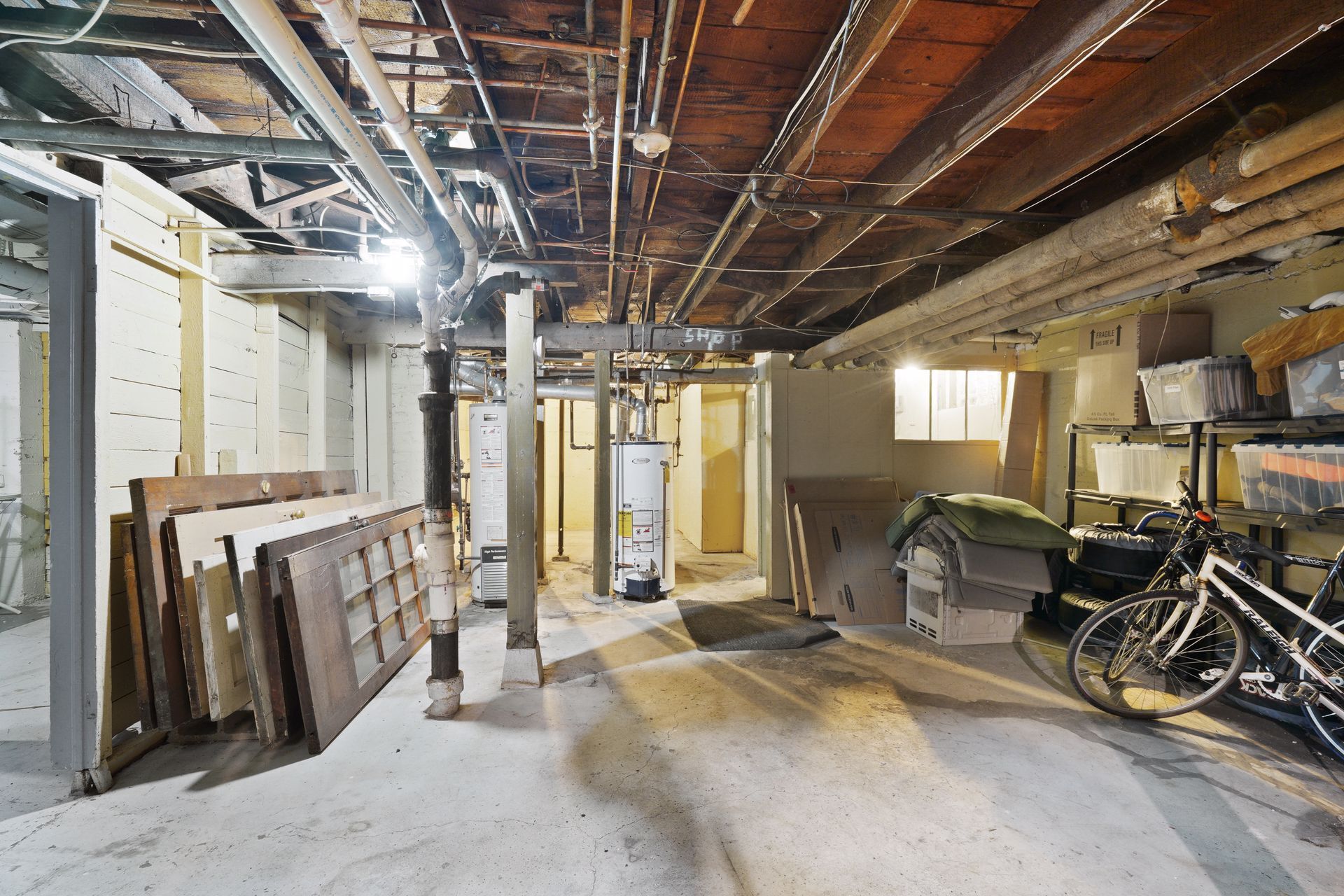 Clean, dry basement. Room for storage and workshop. - 3032 grand ave