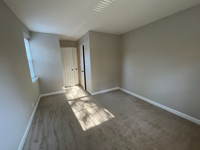 Building Photo - This residence showcases a beautifully upd...