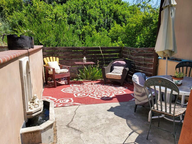 outdoor patio area across from unit there is now a shade retractable cover over patio area. - 929 Oneonta Dr