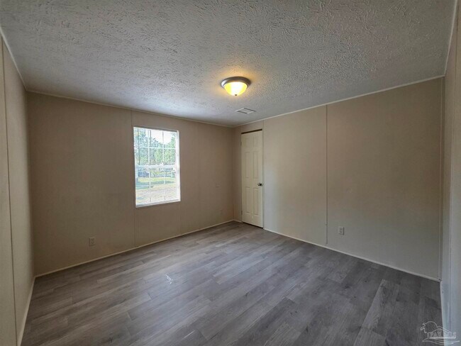 Building Photo - 8906 Figland Ave