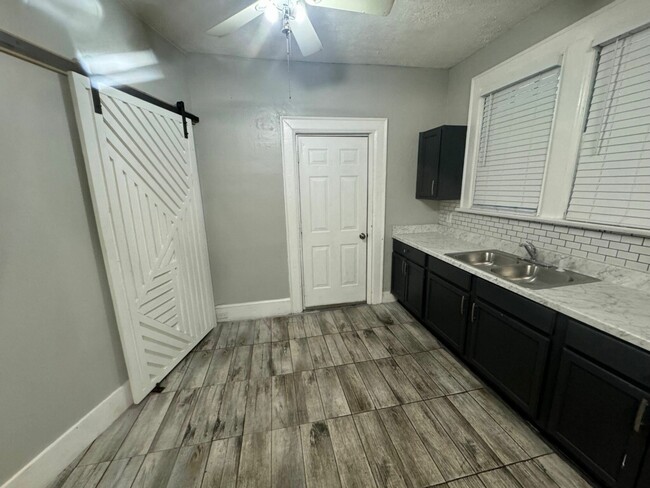 Sliding barn door to storage and pantry - 456 Burton Ave