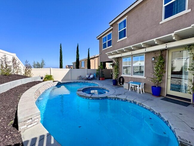 Building Photo - Stunning 5 Bedroom + Office Home with Priv...