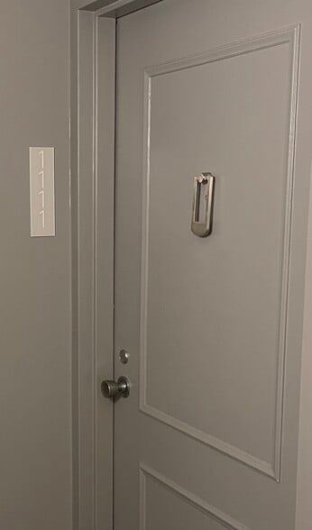 Door with digital number of condo - 4 Monroe St