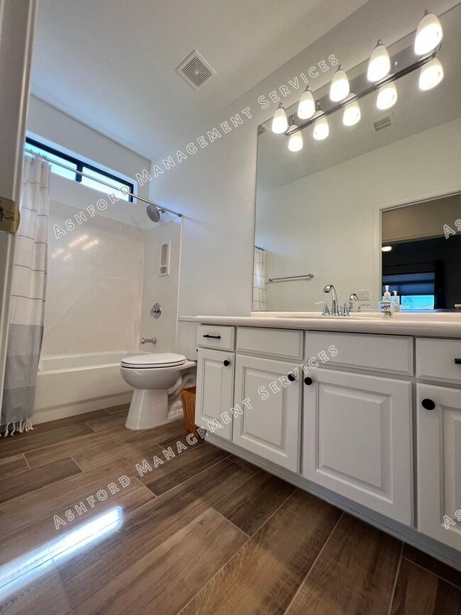 Building Photo - COME HOME TO LUXURY IN GATED GRAYHAWK GOLF...