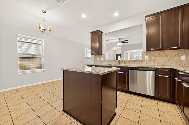 Building Photo - 7219 Victorville Dr