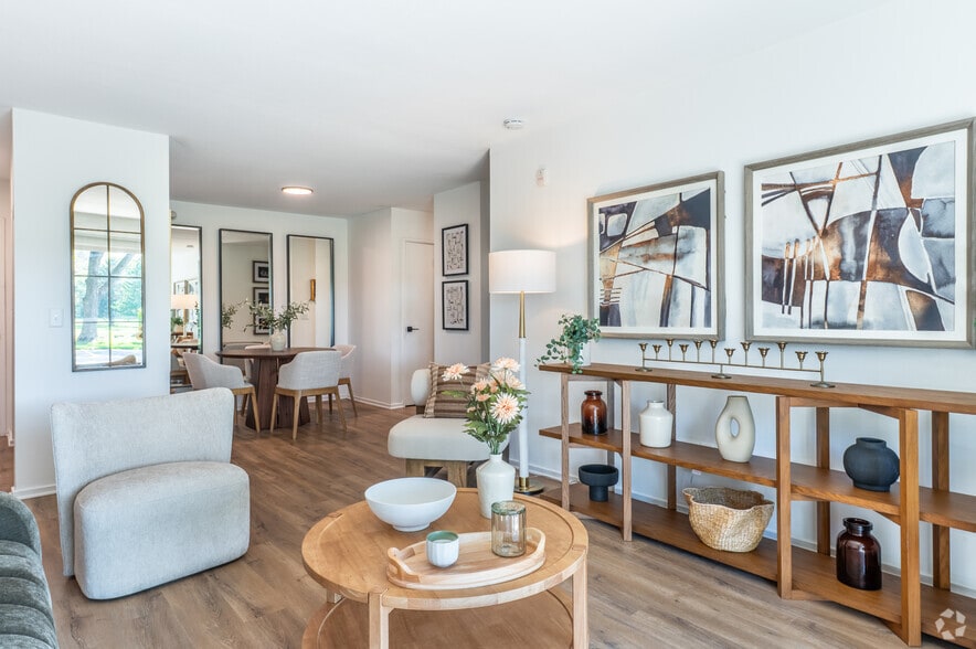 2BR, 1BA - 840SF - Living Room - ReNew at the Greens