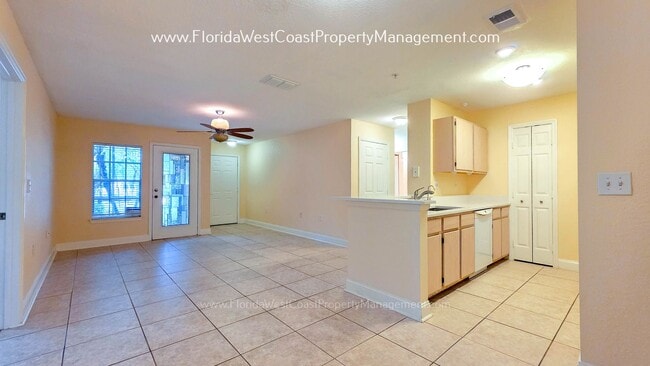 Building Photo - MOVE IN READY! LARGE 2 BEDROOM/2 BATH PLUS ATTACHED GARAGE! TILE/LVP THROUGHOUT!