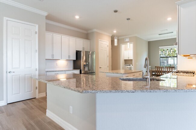 Building Photo - Stunning Country Club East Unfurnished Res...