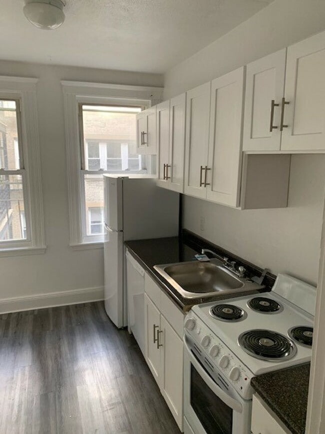 Building Photo - No Brokers fee, No Security Deposit, heat, Hot Water Included, Elevator, Laundry. Steps from the T