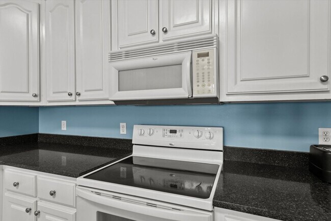 Building Photo - Riverfront Living with Spacious Layout and...