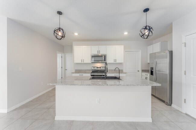 Building Photo - "Spacious 5-Bed Oasis located in SouthShore Bay!