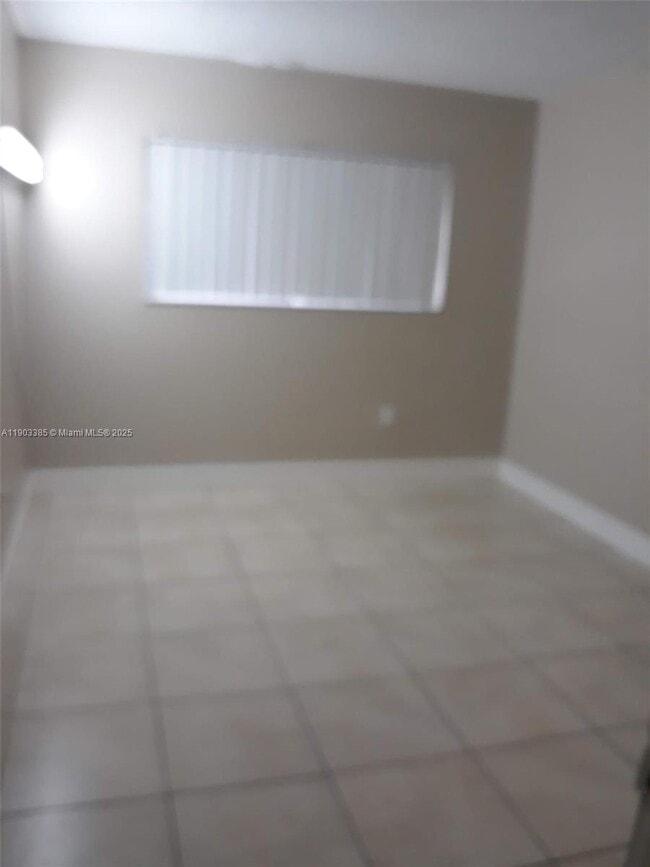 Building Photo - 7401 SW 152nd Ave