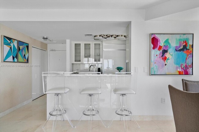 Building Photo - 10275 Collins Ave