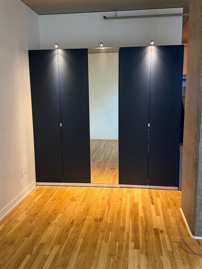 Building Photo - McKenzie Lofts - 2nd floor west facing Pearl District studio w/parking/storage/covered balcony