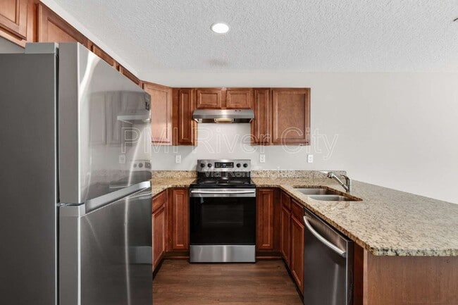 Building Photo - 7608 Rain Forest Dr N