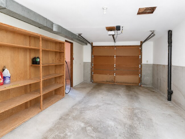 Building Photo - Beautiful Split-Level Home with Fireplace, Deck, Garage, and EV Charger