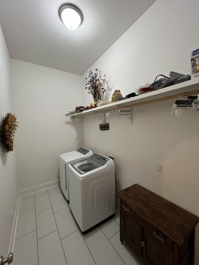 Building Photo - Luxury 4BR Home in Americana | 11 Ft Ceilings, Courtyard Living & Furnished Option at $3,950
