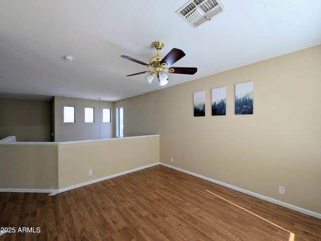 Building Photo - 8861 W Paradise Dr