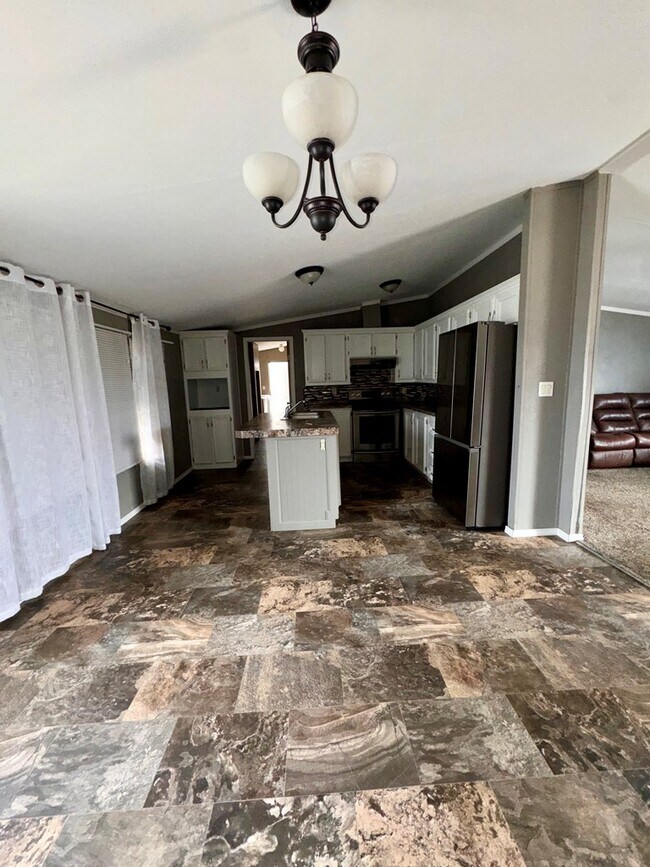 Building Photo - 10136 W University Blvd