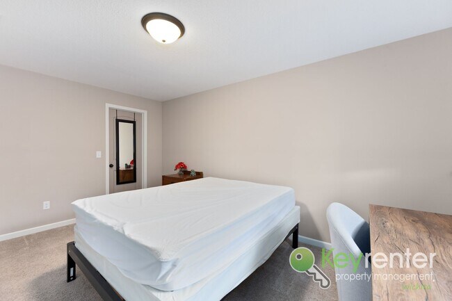 Building Photo - Spacious 4-Bedroom Home with Finished Basement & 3-Car Garage – Derby, KS