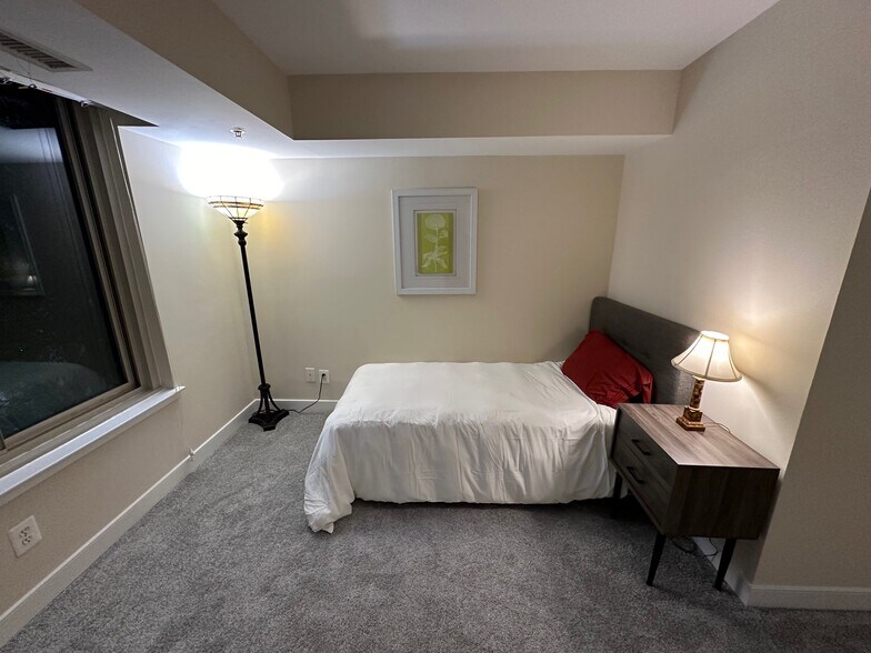 second bedroom (electric desk and laser printer not visbile) - 7500 Woodmont Ave