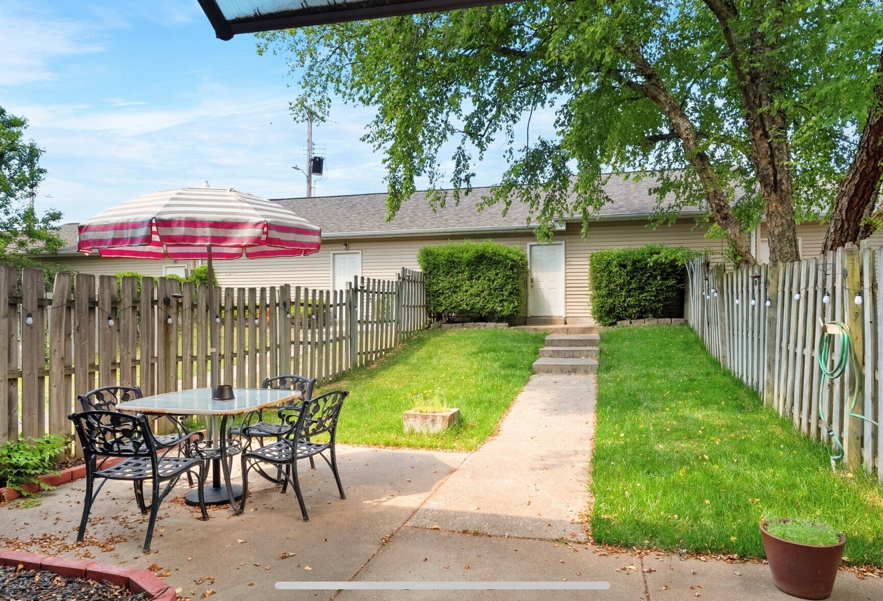 Private Backyard leading to private 2 car garage. - 4109 Westminster Pl
