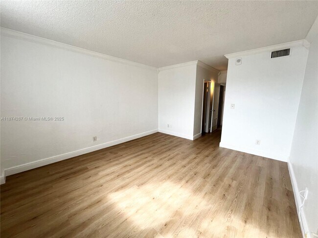 Building Photo - 19390 Collins Ave